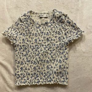 White shirt with blue flowers